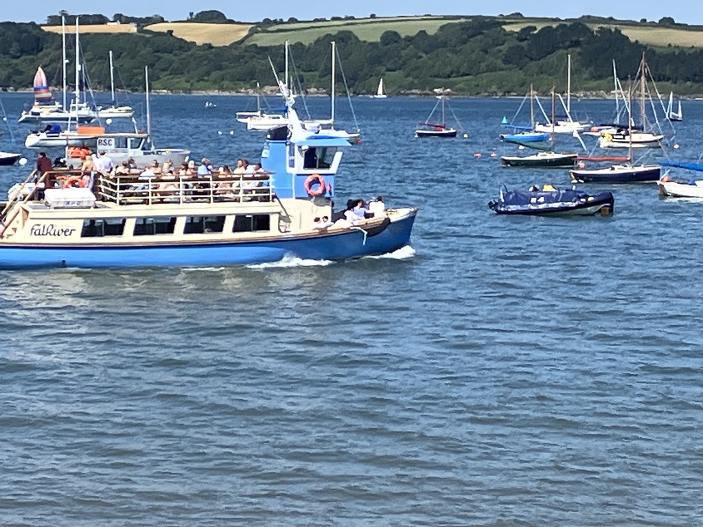 Passenger ferry crossing the Fal estuary among sailing boats